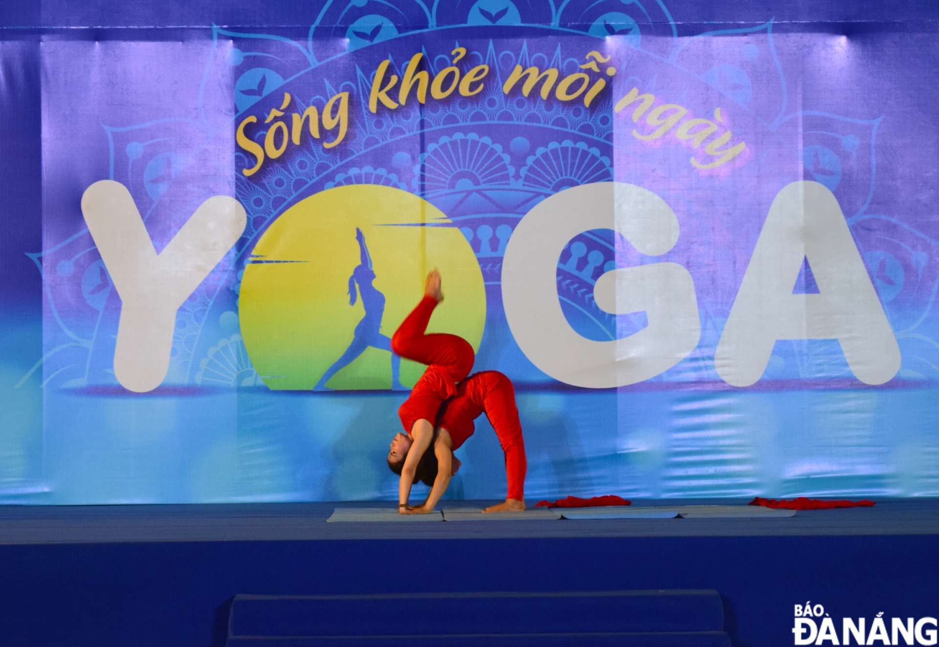 a yoga club in da nang participates in an art performance