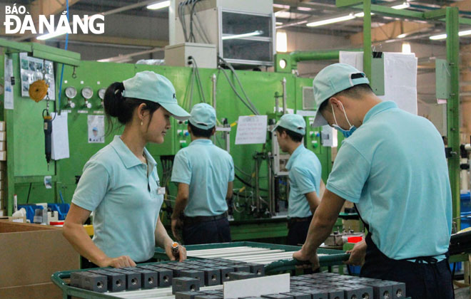 bustling working ambiance observed at the tokyo keiki precision technology co 2c ltd located in the da nang hi tech park