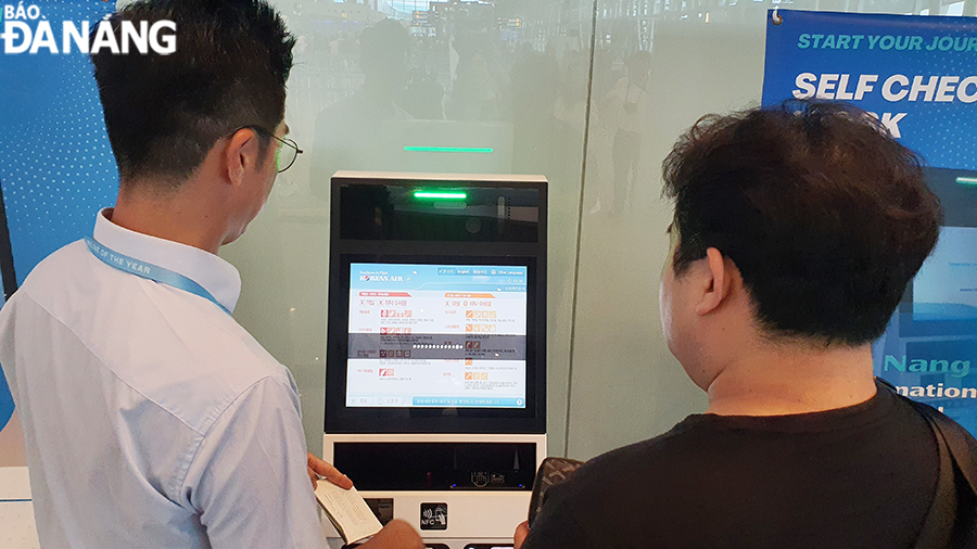 check in tu dong tai san bay 2