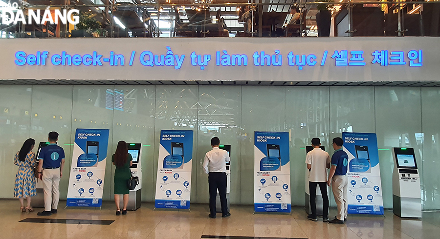 check in tu dong tai san bay