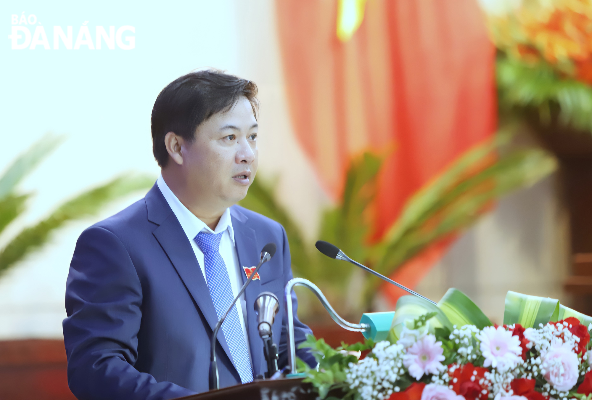 delivering an opening speech