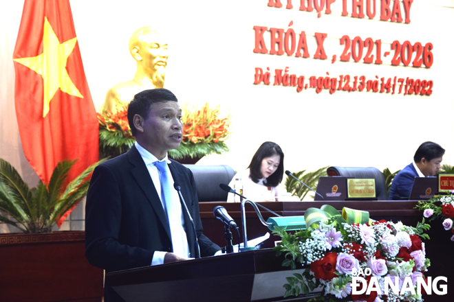 delivers a report at the session