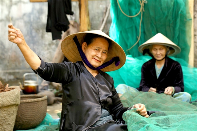 old women in m c3 a2n th c3 a1i village