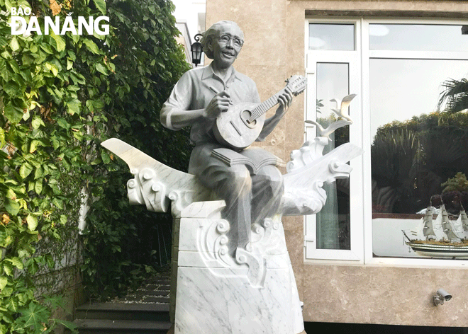 the stone sculpture entitled 27musicians of love songs 27
