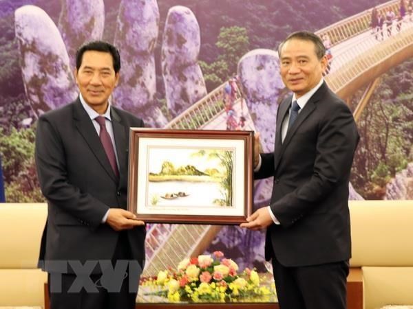 vice chairman of the national assembly of laos bounpone bouttanavong 28l 29 and secretary of the da nang party committee truong quang nghia