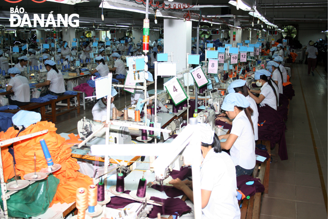 workers at the 29 march textile and garment joint stock company