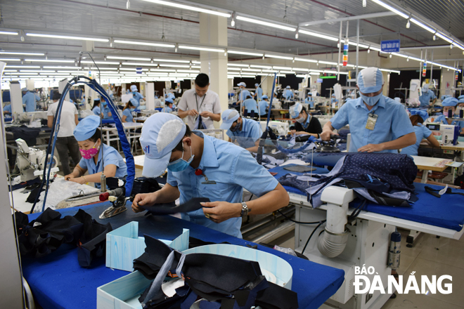 workers at the hoa tho textiles and garments company
